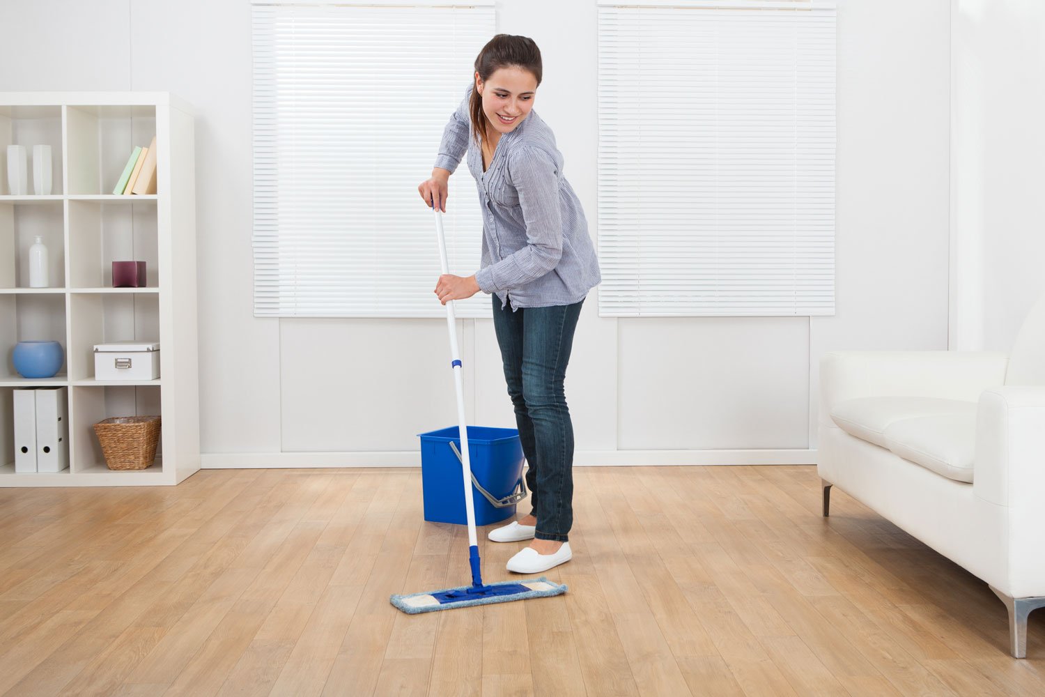Women cleaning living room - Wharton Hardwood Floors